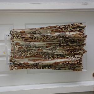 Skirt by ALBERTO MIKALI,  beige print.